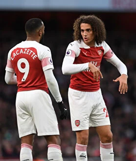 Images Dated 8th December 2018: Arsenal's Guendouzi and Lacazette in Action against Huddersfield Town (2018-19)