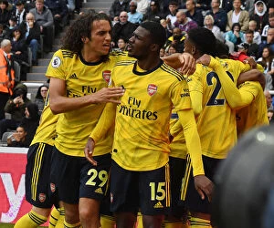 Images Dated 11th August 2019: Arsenal's Guendouzi and Maitland-Niles Celebrate Goal Against Newcastle United (2019-20)