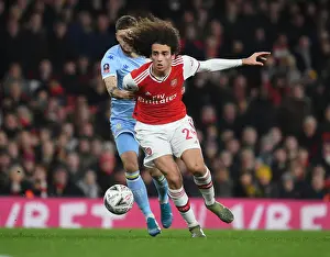 Arsenal's Guendouzi Outmaneuvers Leeds Klich in FA Cup Clash
