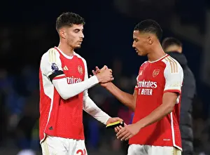Chelsea V Arsenal 2023-24 Prints: Arsenal's Havertz and Saliba Share a Moment After Chelsea Showdown (2023-24 Premier League)