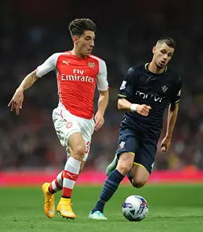 Arsenal V Southampton, League Cup 2014/15 Prints: Arsenal's Hector Bellerin Faces Off Against Southampton's Morgan Schneiderlin in League Cup Clash