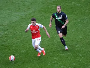 Arsenal V Stoke City 2015-16 Prints: Arsenal's Hector Bellerin Goes Head-to-Head with Marko Arnautovic in Intense Premier League Showdown
