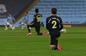 Manchester City V Arsenal 2019-20 Prints: Arsenal's Hector Bellerin Kneels for Black Lives Matter Before Manchester City Match