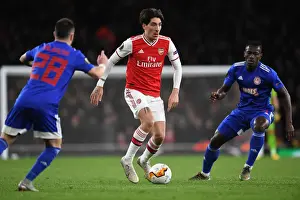 Arsenal's Hector Bellerin Outmaneuvers Olympiacos Mathieu Valbuena in Europa League Clash