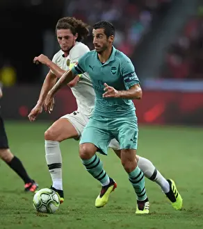 Arsenal V PSG Pre Season Friendly 2018-19 Prints: Arsenal's Henrikh Mkhitaryan Clashes with Paris Saint-Germain's Adrien Rabiot in International Champions Cup