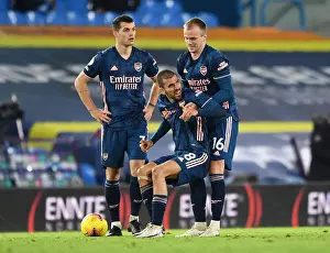 Arsenal's Holding and Ceballos Flanked by Xhaka during Leeds United Clash (2020-21)