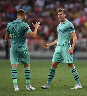 Arsenal's Holding and Chambers Celebrate Goal Against Paris Saint-Germain in 2018 International Champions Cup, Singapore