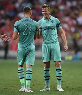 Arsenal's Holding and Chambers Celebrate Goal Against Paris Saint-Germain in 2018 International Champions Cup, Singapore