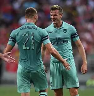 Arsenal's Holding and Chambers Celebrate Goal Against Paris Saint-Germain in 2018 International Champions Cup