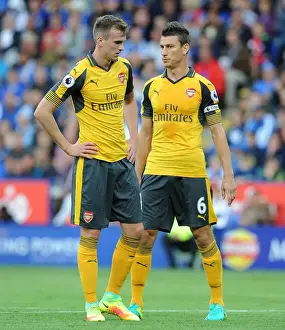 Leicester City V Arsenal 2016-17 Prints: Arsenal's Holding and Koscielny in Action: Premier League 2016-17 - Leicester City vs Arsenal