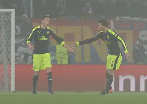 FC Basel V Arsenal 2016-17 Prints: Arsenal's Holding and Koscielny Face Off Against FC Basel in 2016-17 Champions League