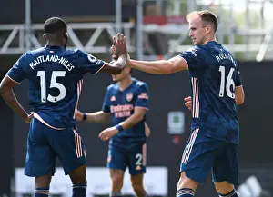 Arsenal's Holding and Maitland-Niles Celebrate during Fulham Match, 2020-21 Premier League