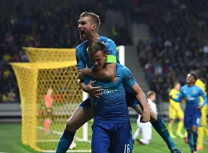 FC BATE Borisov V Arsenal 2017-18 Prints: Arsenal's Holding and Mertesacker Celebrate Goals in UEFA Europa League Match against BATE Borisov