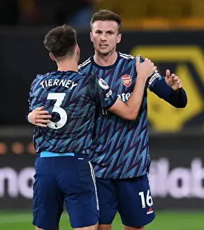 Arsenal's Holding and Tierney Celebrate Victory Over Wolverhampton Wanderers in Premier League