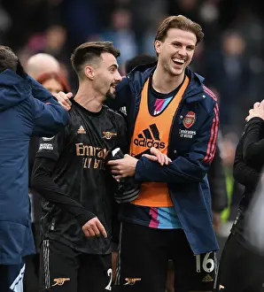 Arsenal's Holding and Vieira Celebrate Victory over Fulham in Premier League Clash