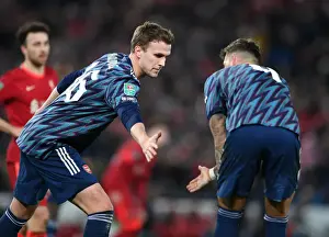 Arsenal's Holding and White Brace Anfield Fortress in Carabao Cup Semi-Final