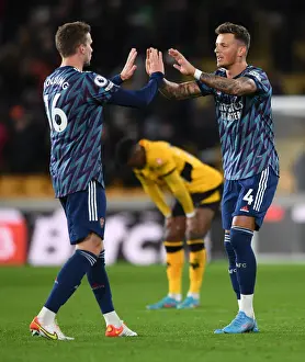 Arsenal's Holding and White Celebrate Victory Over Wolverhampton Wanderers in Premier League