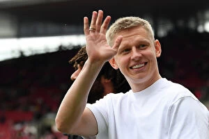 Images Dated 14th May 2023: Arsenal's Injured Zinchenko Bids Farewell to Fans vs. Brighton & Hove Albion (2022-23)