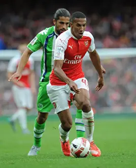 Arsenal V Wolfsburg - Emirates Cup 2015/16 Prints: Arsenal's Isaac Hayden vs. VfL Wolfsburg's Ricardo Rodriguez: A Clash of Titans at Emirates Cup 2015/16