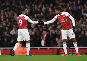 Arsenal V Manchester United 2018-19 Prints: Arsenal's Iwobi and Lacazette in Action against Manchester United