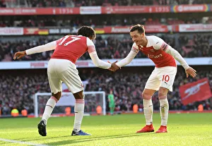 Arsenal's Iwobi and Ozil Celebrate Goal Against Burnley, 2018-19 Premier League