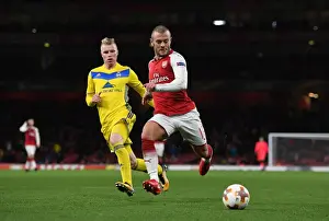 Arsenal V BATE Borisov 2017-18 Prints: Arsenal's Jack Wilshere Clashes with BATE Borisov's Evgeni Berezkin in Europa League Showdown