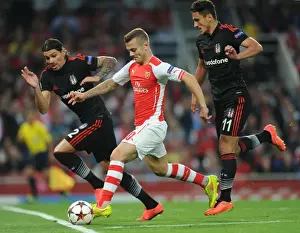 Arsenal V Besiktas 2014/15 Prints: Arsenal's Jack Wilshere Clashes with Besiktas's Mustafa Pektemek