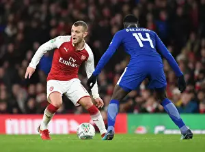 Arsenal V Chelsea - Carabao Cup 2017-18 Prints: Arsenal's Jack Wilshere Clashes with Chelsea's Tiemoue Bakayoko in Carabao Cup Semi-Final