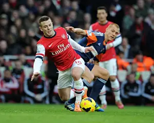 Arsenal V Fulham 2013-14 Prints: Arsenal's Jack Wilshere Clashes with Fulham's Steve Sidwell in Premier League Showdown