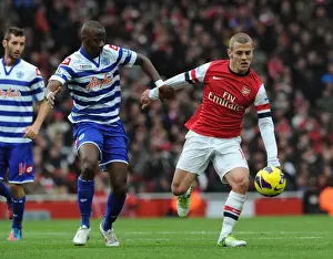 Arsenal V Queens Park Rangers 2012-13 Prints: Arsenal's Jack Wilshere Clashes with QPR's Samba Diakite in Premier League Showdown
