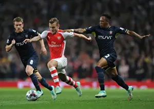 Arsenal's Jack Wilshere Clashes with Southampton's Davis and Clyne in League Cup Showdown