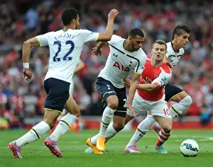 Arsenal V Tottenham Hotspur 2014-15 Prints: Arsenal's Jack Wilshere Clashes with Tottenham's Lamela, Capoue, and Chadli