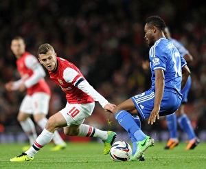 Arsenal V Chelsea - Capital One Cup 4th Rd 2013-14 Prints: Arsenal's Jack Wilshere Closes Down Chelsea's John Mikel Obi - Capital One Cup 4th Round