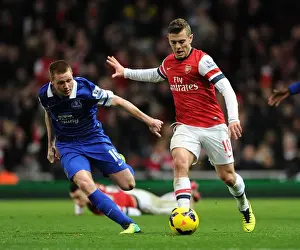 Everton Prints: Arsenal's Jack Wilshere Faces Off Against Everton's James McCarthy in Premier League Clash