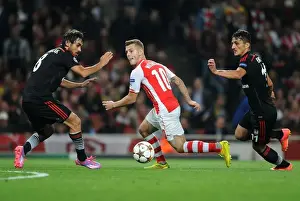 Arsenal's Jack Wilshere Goes Head-to-Head with Mustafa Pektemek and Ersan Gulum in Intense UEFA Champions League Showdown