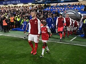 Chelsea v Arsenal - Carabao Cup 1/2 final 1st leg 2017-18 Collection: Arsenal's Jack Wilshere Leads Team Out in Carabao Cup Semi-Final vs Chelsea