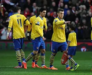 Arsenal's Jack Wilshere and Mikel Arteta with the Mascot Before Liverpool vs Arsenal, Premier League 2013-14