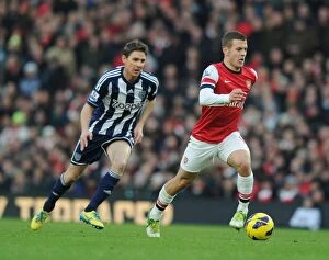 Images Dated 8th December 2012: Arsenal's Jack Wilshere Outmaneuvers West Brom's Zoltan Gera during the 2012-13 Premier League Match