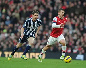 Arsenal's Jack Wilshere Outmaneuvers West Brom's Zoltan Gera during the 2012-13 Premier League Match