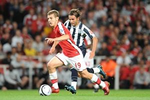 Arsenal's Jack Wilshere Shines in 2:0 Carling Cup Victory over West Brom's Filipe Teixeira