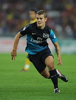 Images Dated 13th July 2011: Arsenal's Jack Wilshere Stars: 4-0 Victory Over Malaysia XI, Bukit Jalil Stadium, 2011