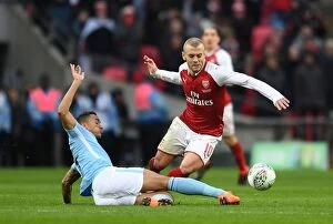Images Dated 25th February 2018: Arsenal's Jack Wilshere Tackled by Manchester City's Danilo in Carabao Cup Final Showdown