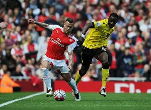 Arsenal V Aston Villa 2015-16 Prints: Arsenal's Jack Wilshere vs. Aston Villa's Aly Cissokho: A Premier League Face-Off