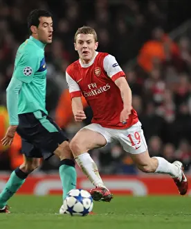 Arsenal's Jack Wilshere vs Barcelona's Sergio Busquets: A Battle in the Arsenal 2:1 Victory, UEFA Champions League, Emirates Stadium, 2011