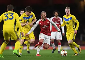 Arsenal V BATE Borisov 2017-18 Prints: Arsenal's Jack Wilshere vs BATE Borisov's Stanislav Dragun: A Battle in the Europa League Clash