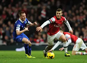 Everton Prints: Arsenal's Jack Wilshere vs Everton's James McCarthy: Intense Battle in the Midfield