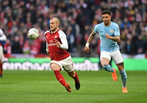 Arsenal V Manchester City - Carabao Cup Final 2018 Prints: Arsenal's Jack Wilshere vs
