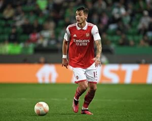 Sporting Lisbon v Arsenal 2022-23 Collection: Arsenal's Jakub Kiwior Faces Off Against Sporting CP in Europa League Clash