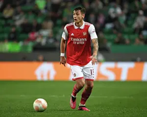 Sporting Lisbon V Arsenal 2022-23 Prints: Arsenal's Jakub Kiwior Faces Off Against Sporting CP in Europa League Clash