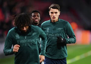 Images Dated 12th December 2023: Arsenal's Jakub Kiwior Gears Up for PSV Eindhoven Clash in Champions League Group Stage